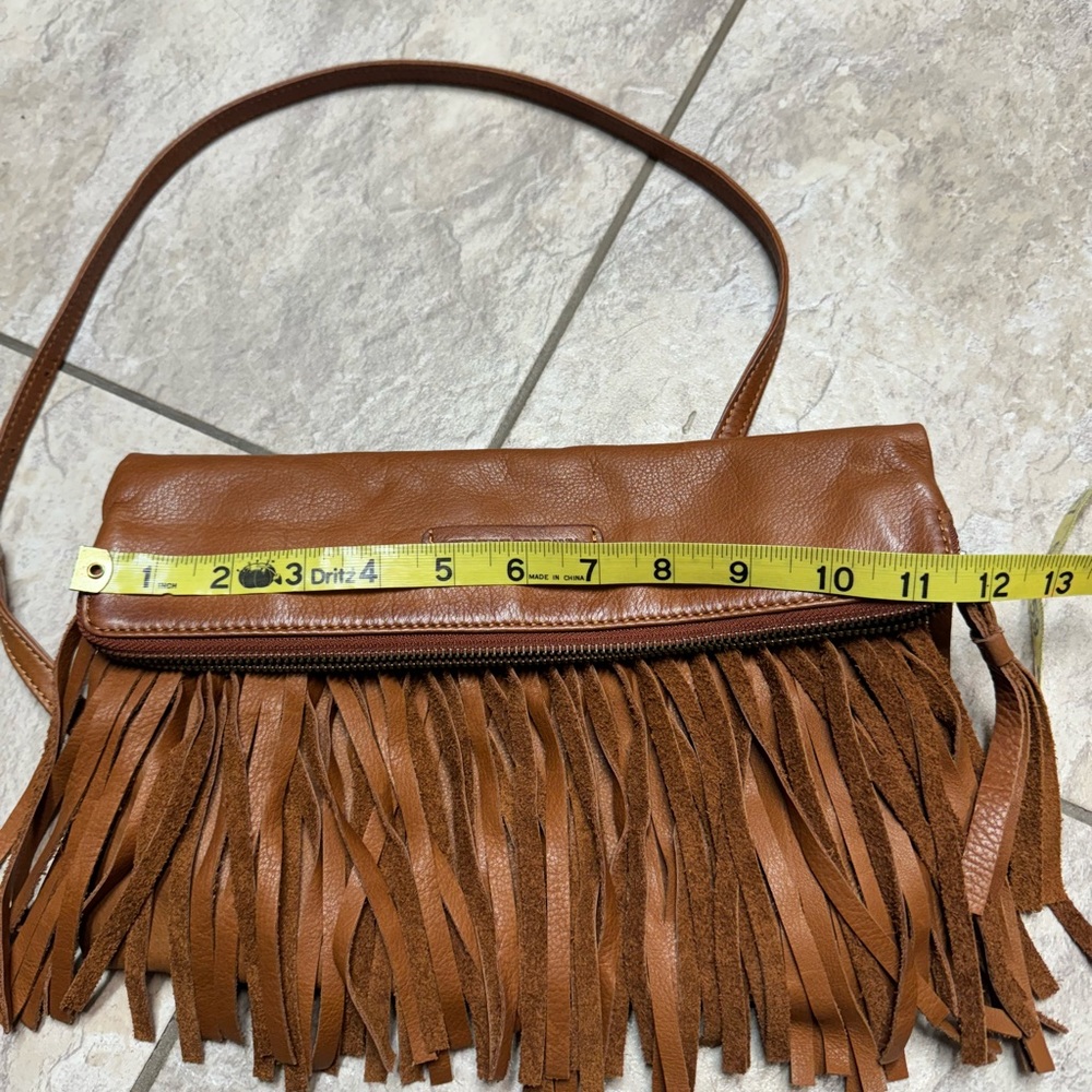 Frye crossbody purse with fringe.
